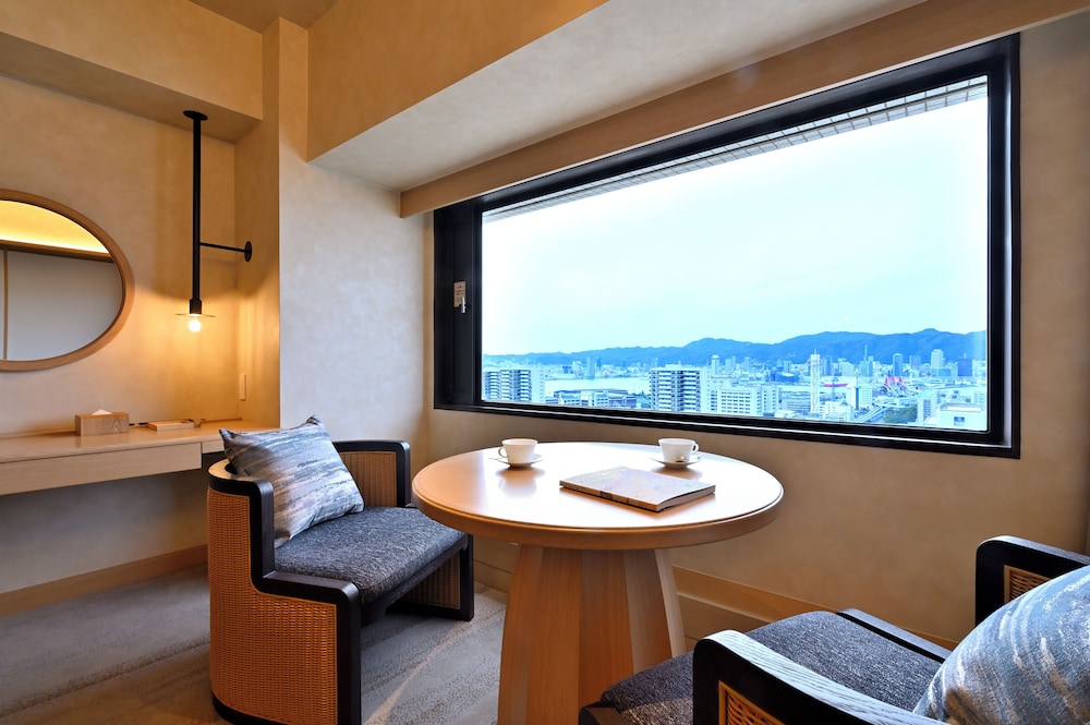 本館エグゼクティブフロア セレブリティスイートツイン (禁煙)(ジム・屋内プール無料) リビング エリア0 | 神戸ポートピアホテル