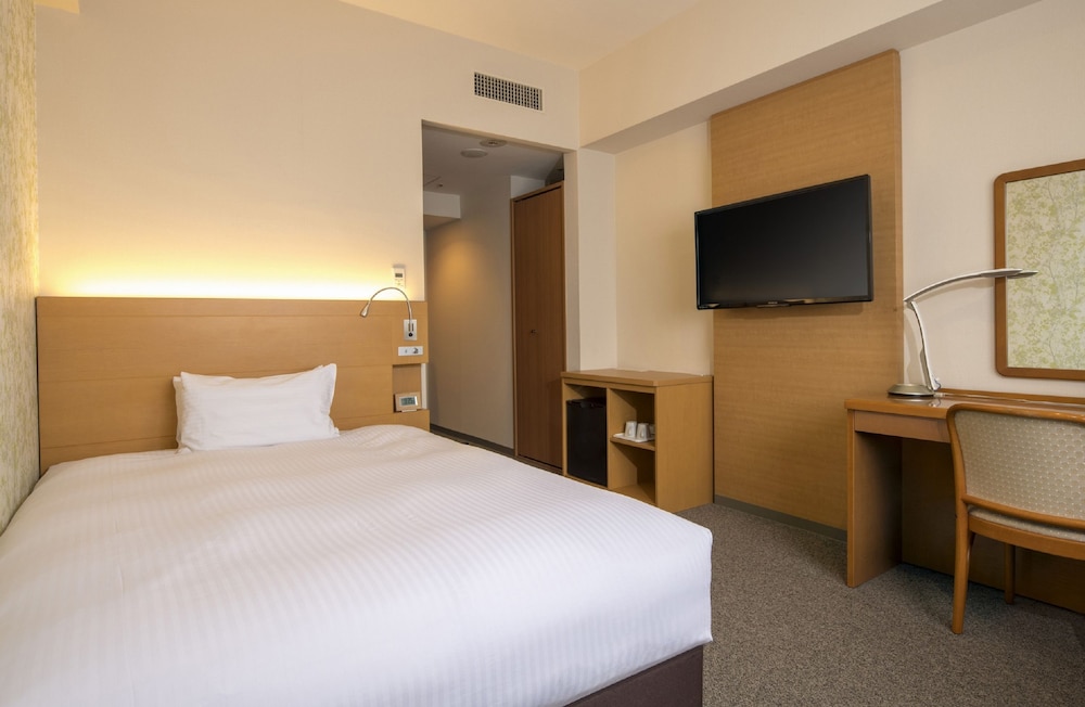 エコノミー ダブルルーム セミダブルベッド 1 台 禁煙 客室1 | チサン グランド 長野