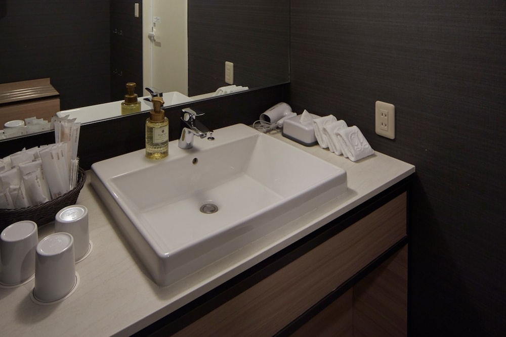 26th-32th デラックスツインルーム 禁煙 高層階 バスルームのシンク0 | サンシャインシティプリンスホテル