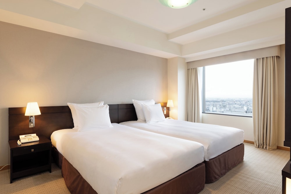 プレミアム ルーム ダブルベッド 2 台 マウンテンビュー 客室1 | ANAクラウンプラザホテル富山 by IHG