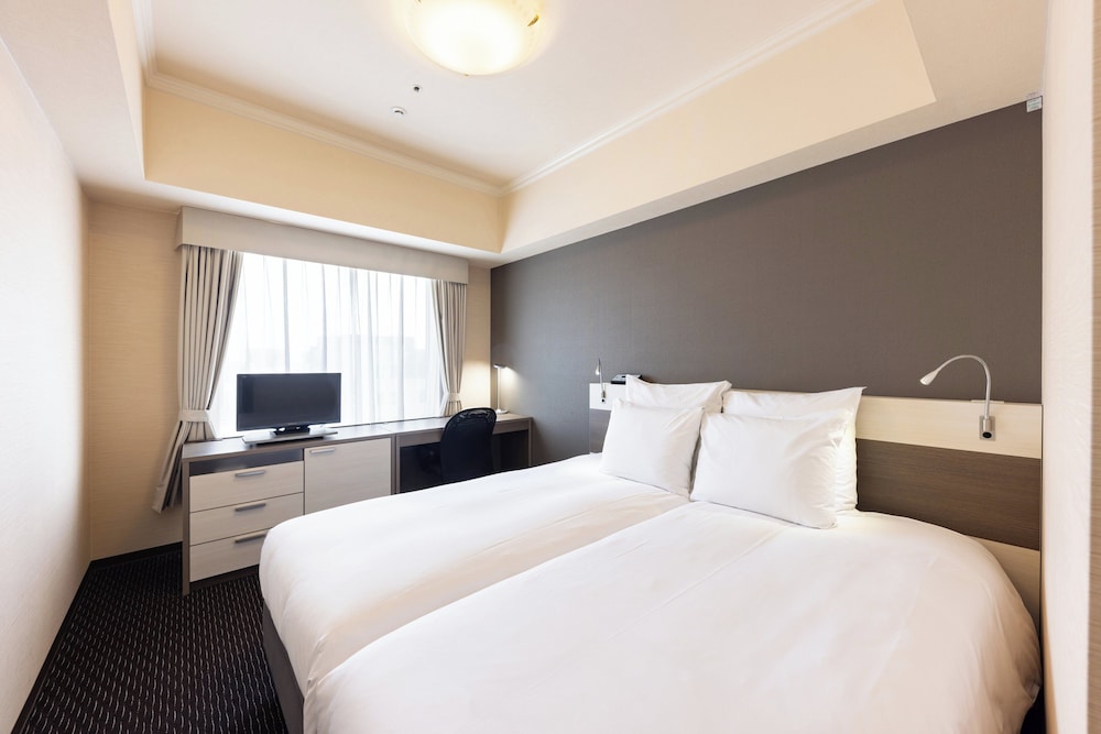 スタンダード ルーム シングルベッド 2 台 客室1 | ANAクラウンプラザホテル富山 by IHG