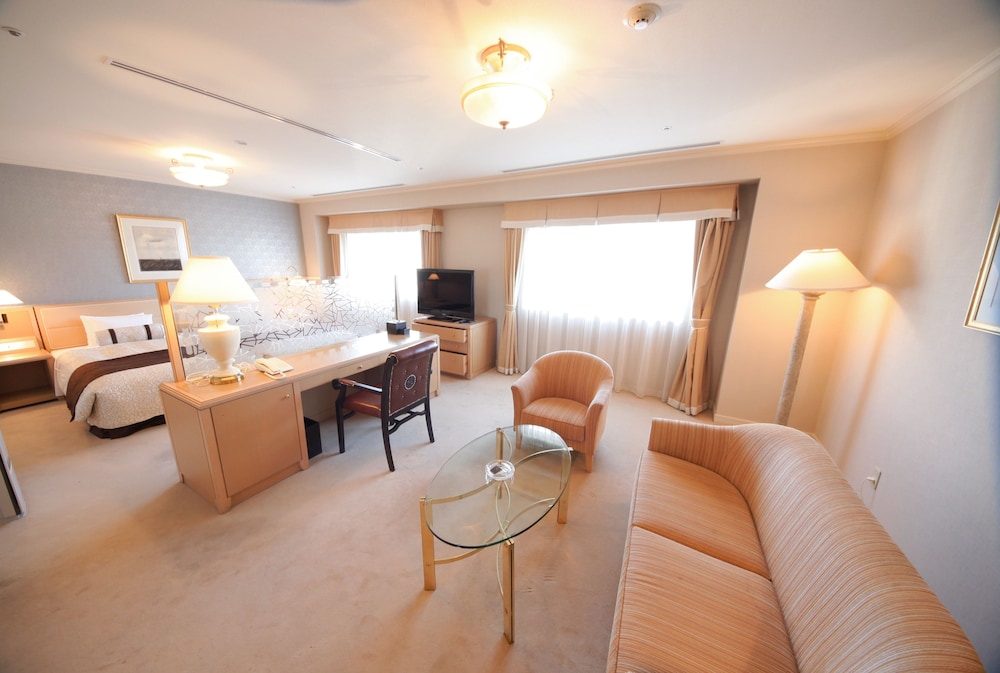 デラックス ツインルーム 禁煙 リビング エリア0 | 沼津リバーサイドホテル