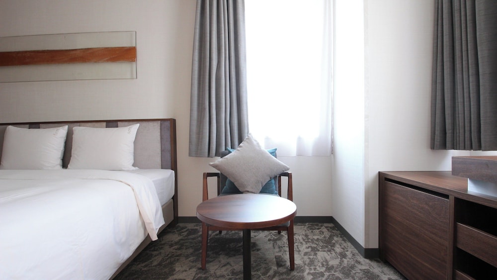 プレミアム ルーム キングベッド 1 台 禁煙 (High Floor) 客室の設備とサービス8 | ANAホリデイ・イン仙台 by IHG