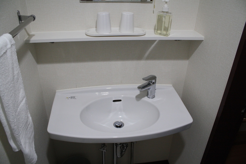 和室 専用トイレ付 共用バスルーム (朝食+夕食付) 客室3 | ホテルグランドトーヤ