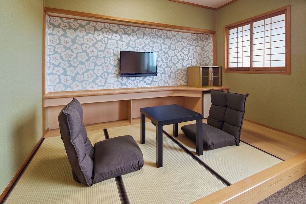 ノースウイング 和洋室 リビング エリア0 | 亀の井ホテル 阿蘇 パークリゾート