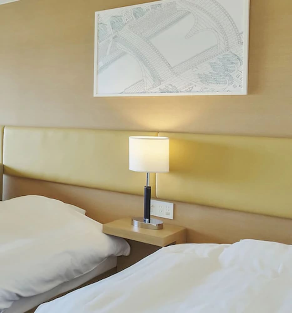 ツインルーム最上階 Kaze Hotel、改装済み 客室1 | i+Land nagasaki