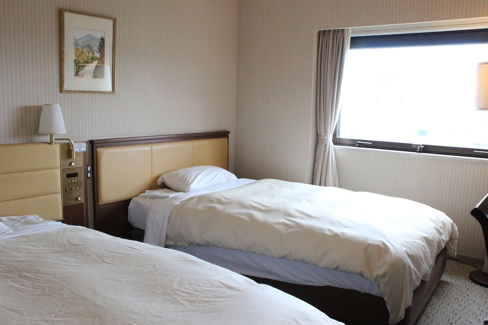 ツインルーム 喫煙可 客室1 | ホテル グランテラス富山