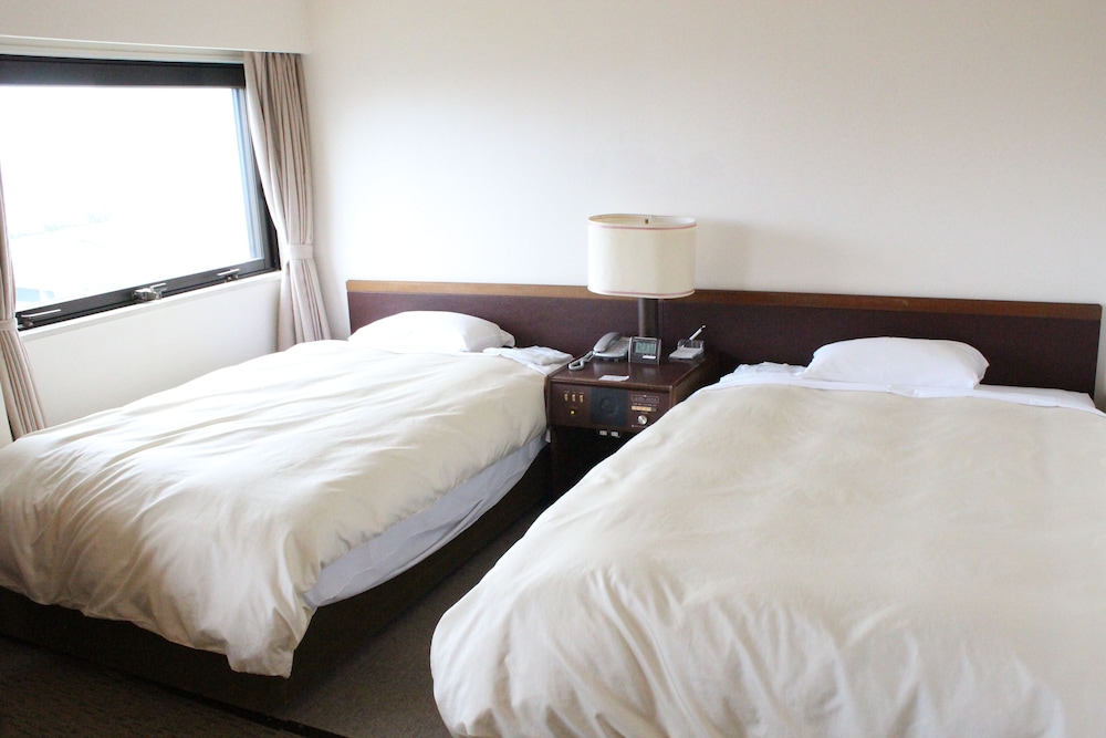 デラックス ツインルーム 喫煙 客室2 | ホテル グランテラス富山
