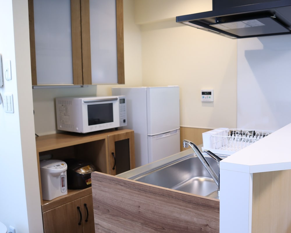 Cタイプ アイランドキッチン 52㎡ 禁煙 専用キッチン2 | 全室半露天風呂付きコンドミニアムホテル　ガーランドコート宇佐美