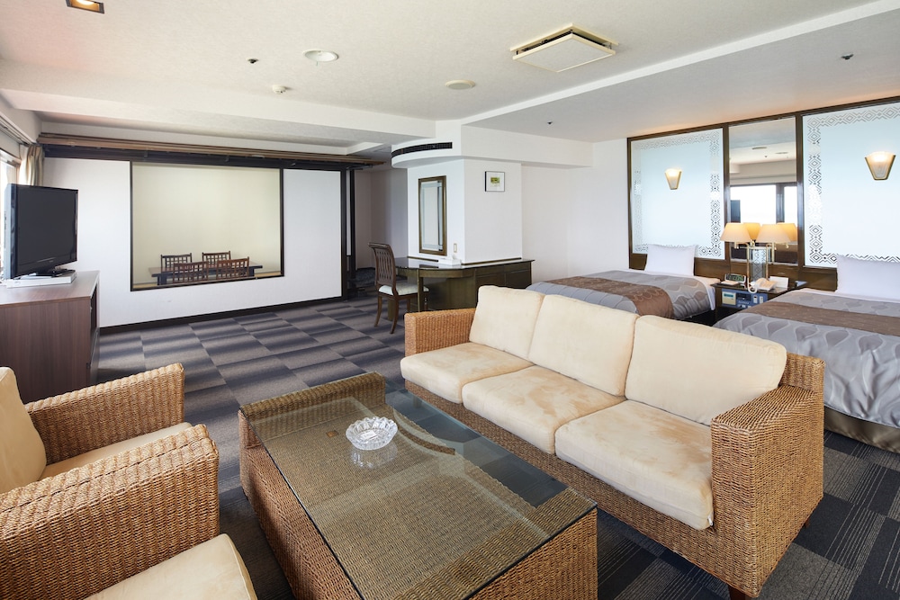 エグゼクティブルーム リビング エリア0 | リゾートホテルベルパライソ