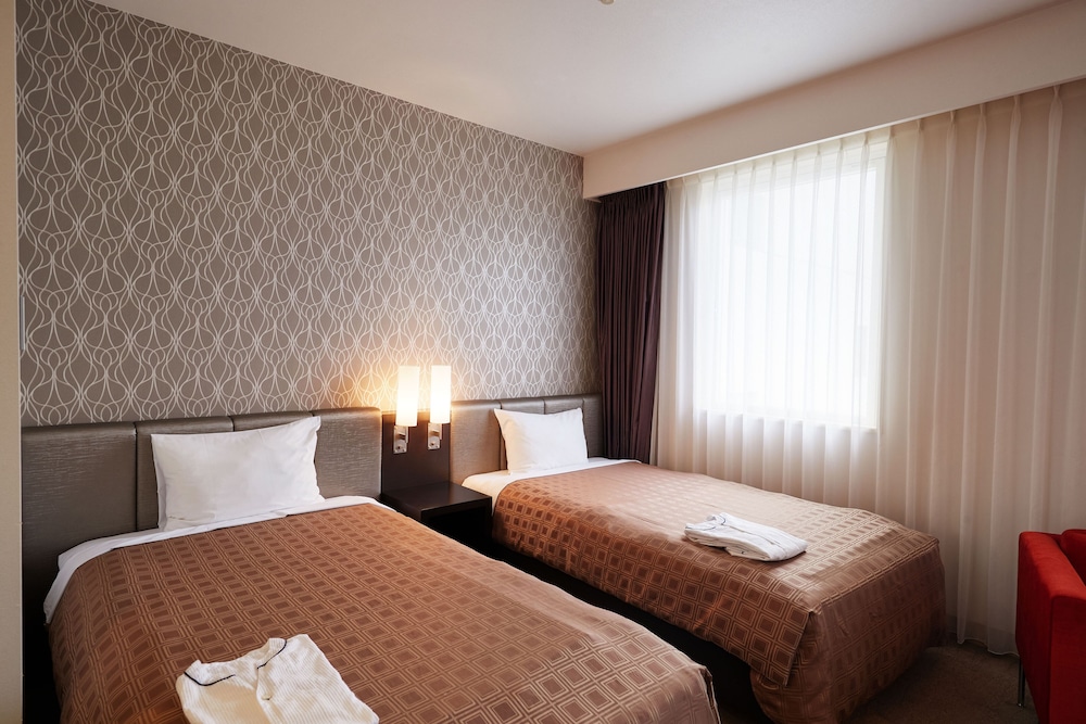 ツインルーム 喫煙可 客室1 | ホテルユクエスタ旭橋