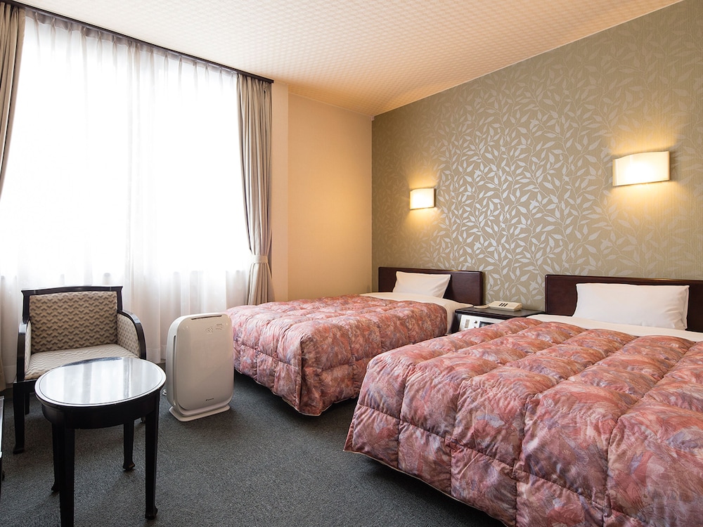 ツインルーム 禁煙(セミダブルベッド2台) 客室1 | 琴平リバーサイドホテル