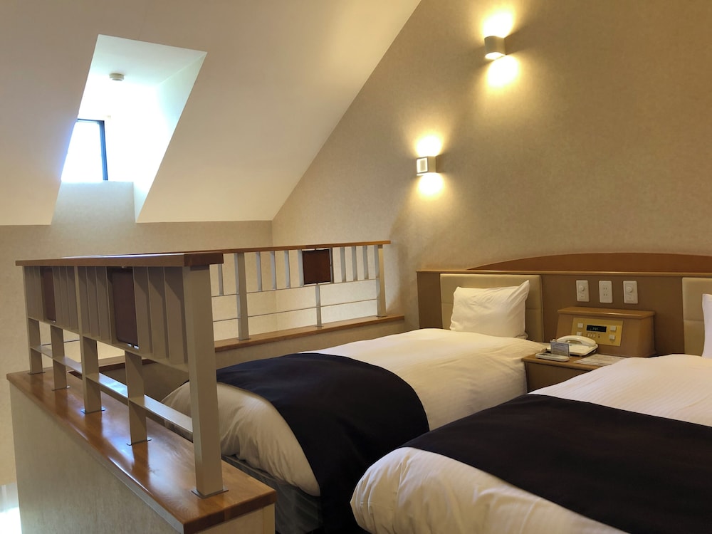 メゾネットツインルーム マウンテンビュー 客室1 | スパ & ホテルリゾート ふらのラテール