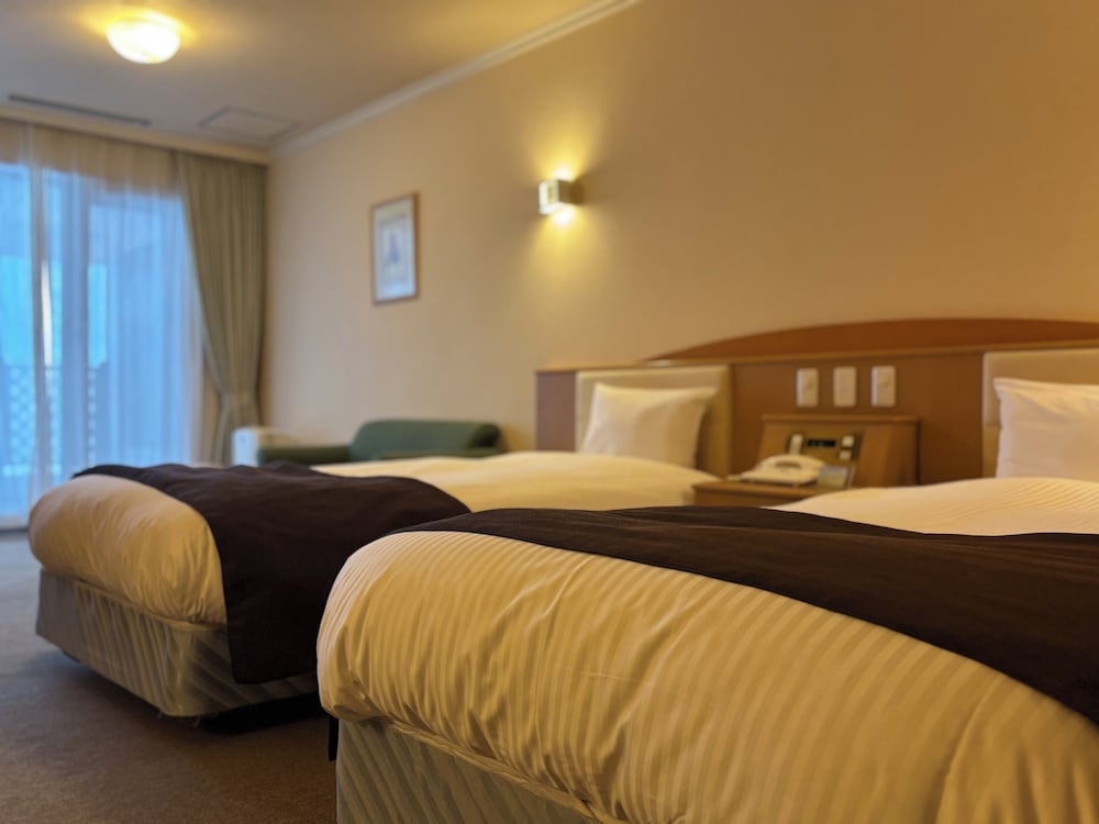 プレミア ツインルーム ベッド (複数台) 専用バスルーム マウンテンビュー 客室3 | スパ & ホテルリゾート ふらのラテール