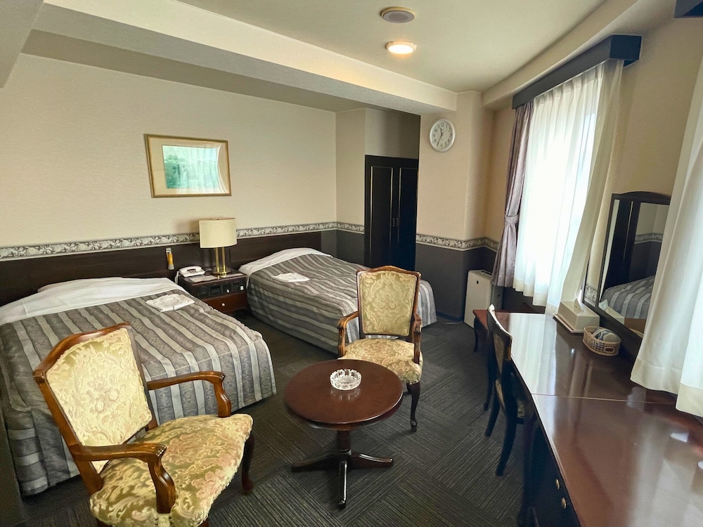 デラックス ツインルーム シティビュー | シーサイドホテルかもめ