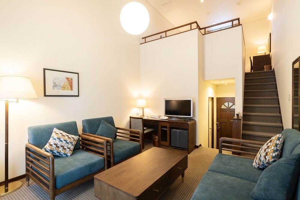 デラックス スイート リビング エリア2 | ホリデイビラ ホテル & リゾート軽井沢