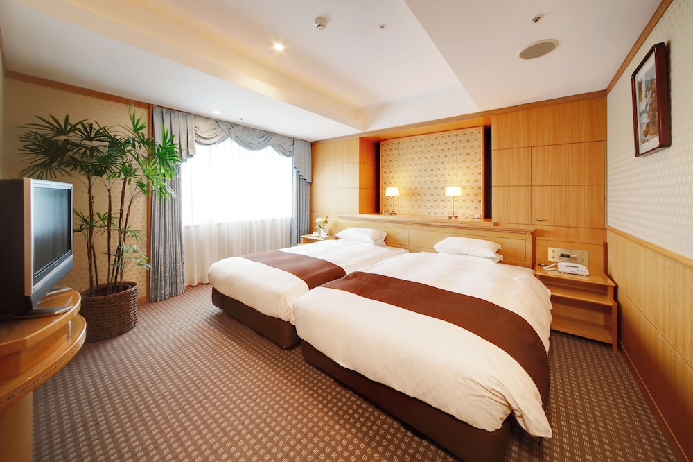 ジュニアスイートルーム 禁煙　 (添い寝分お子様のお食事代は追加料金現地精算となります) 客室1 | 名鉄グランドホテル