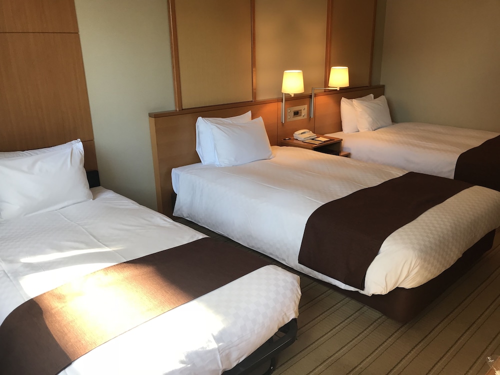 トリプルルーム 禁煙 (2シングルベッド+1エキストラベッド) (添い寝分お子様のお食事代は追加料金現地精算となります) 客室1 | 名鉄グランドホテル