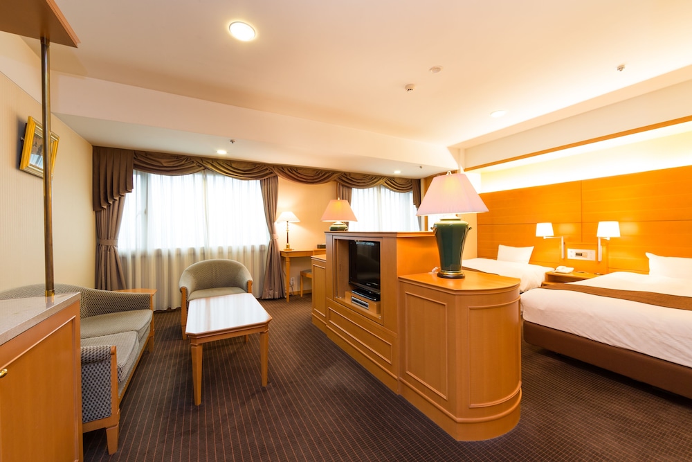 デラックスツインルーム 喫煙可 (添い寝分お子様のお食事代は追加料金現地精算となります) 客室2 | 名鉄グランドホテル