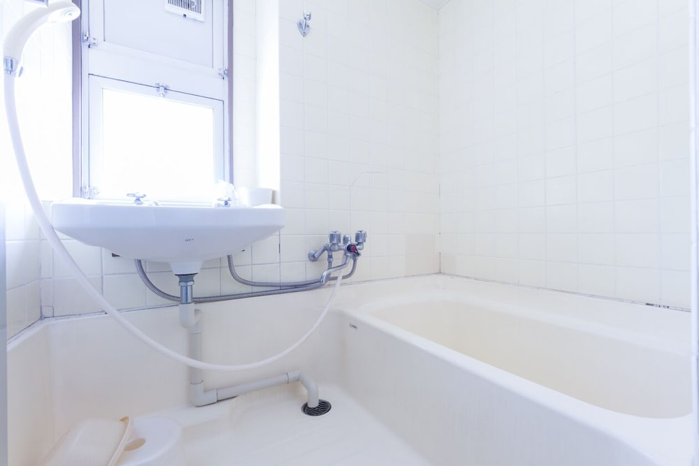 和室6畳　ファミリールーム バスルーム1 | ヴィラ道後