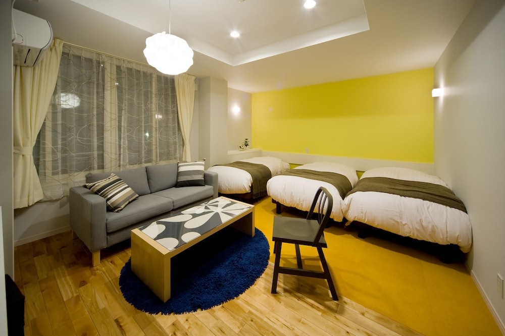 スーペリア トリプルルーム シングルベッド 3 台 客室1 | ホリデイハウス　グリーンガーデン