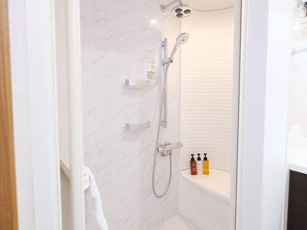 東館 ツインルーム　B-SB [シャワーブース付]　禁煙　 バスルームのシャワー0 | 天然温泉　松山ニューグランドホテル