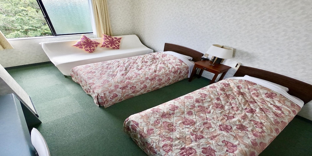 ツインルーム 客室1 | ペンションムーンヴィラ