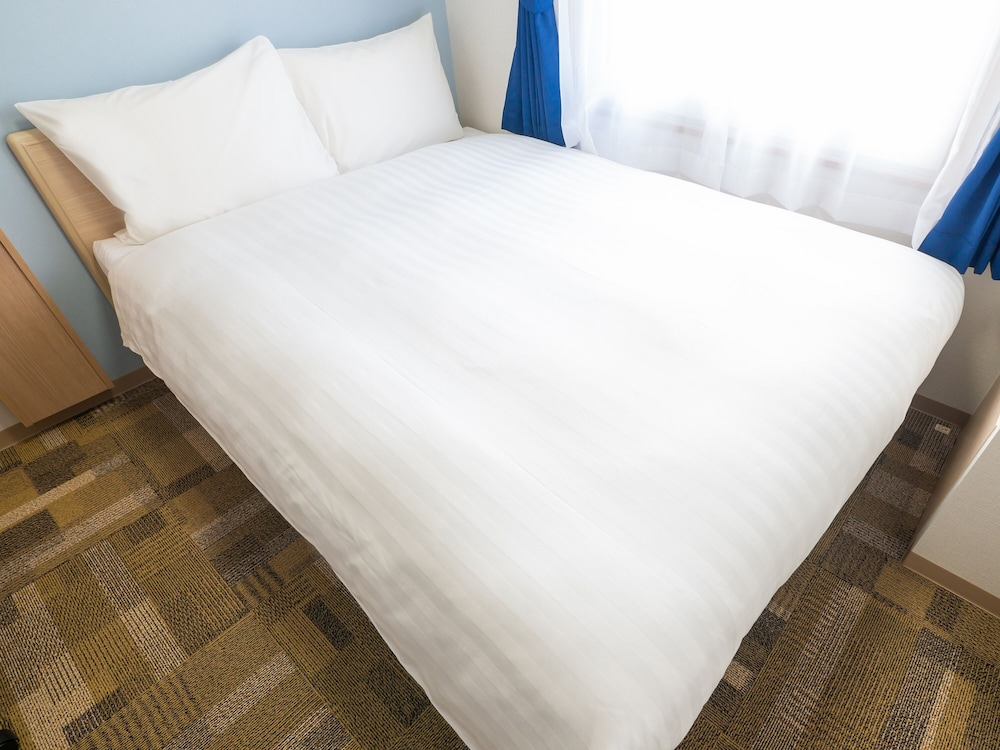 エコノミーダブル 喫煙可 (電子タバコ専用) 客室1 | 東横 INN 御殿場駅前