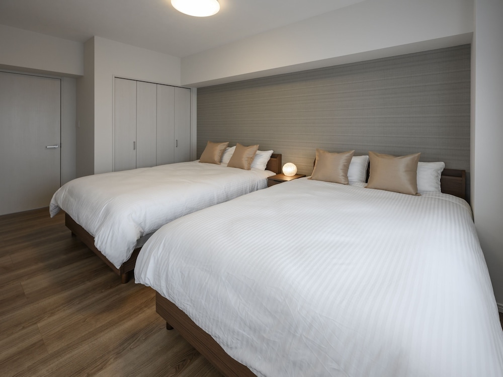 ファミリー アパートメント 2 ベッドルーム キッチン シティビュー 客室2 | &Monde.Okinawa Arena Condominium