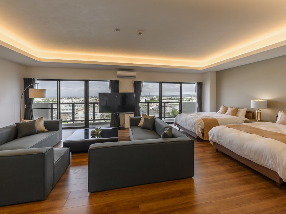 エグゼクティブ アパートメント 3 ベッドルーム キッチン シティビュー リビング エリア0 | &Monde.Okinawa Arena Condominium