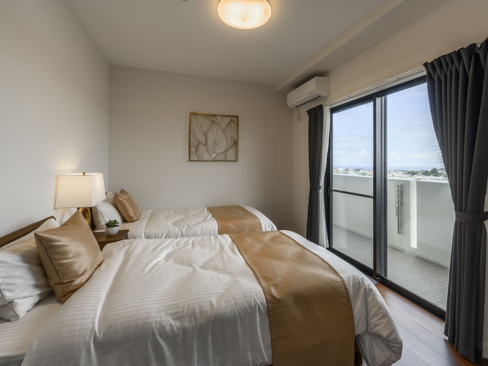 エグゼクティブ アパートメント 3 ベッドルーム キッチン シティビュー 客室5 | &Monde.Okinawa Arena Condominium