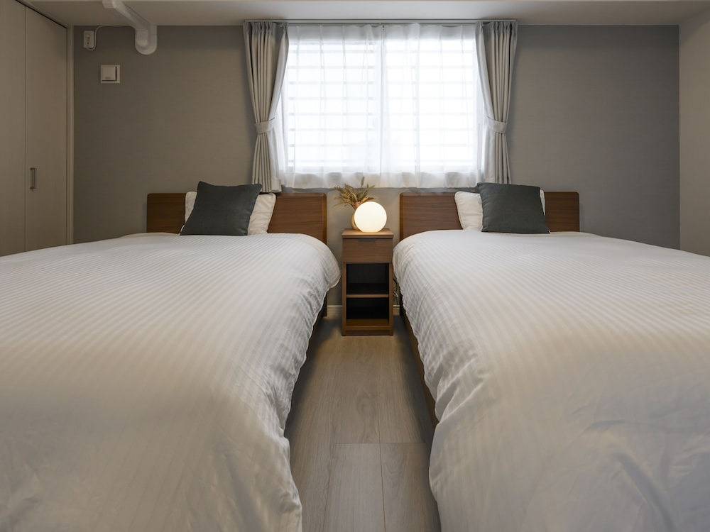 スーペリア アパートメント 2 ベッドルーム キッチン シティビュー 客室2 | &Monde.Okinawa Arena Condominium