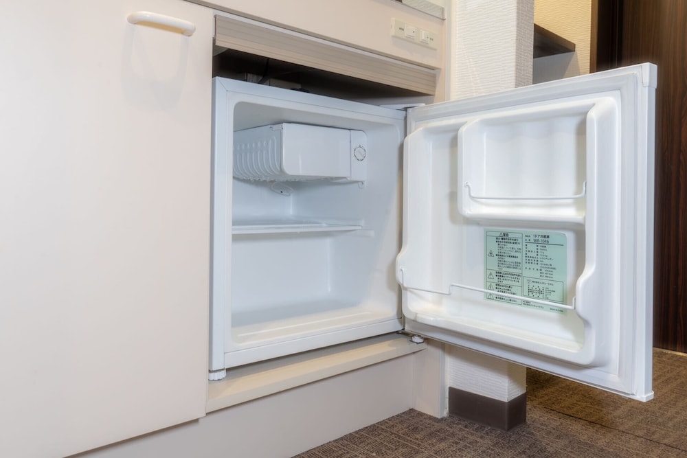 コンフォート トリプルルーム ダブルベッド 1 台ソファーベッド付き パークビュー リビング エリア3 | INA HOUSE GION