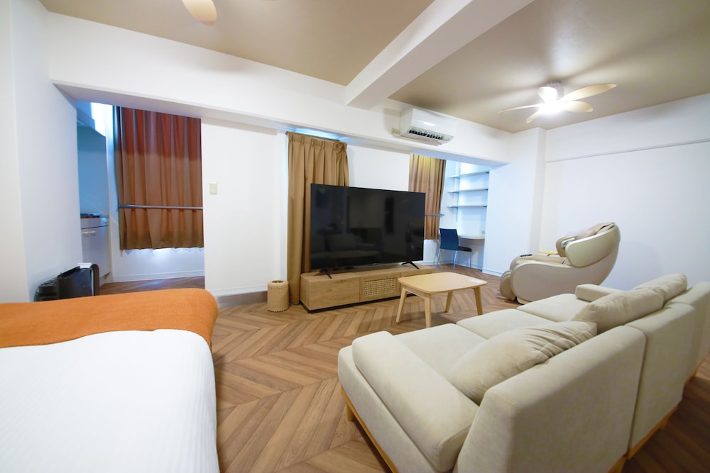 ジュニアスイートルーム　クイーンベッド1台　禁煙　清掃料金別　連泊時の清掃なし 客室5 | 宮崎マンゴーホテル