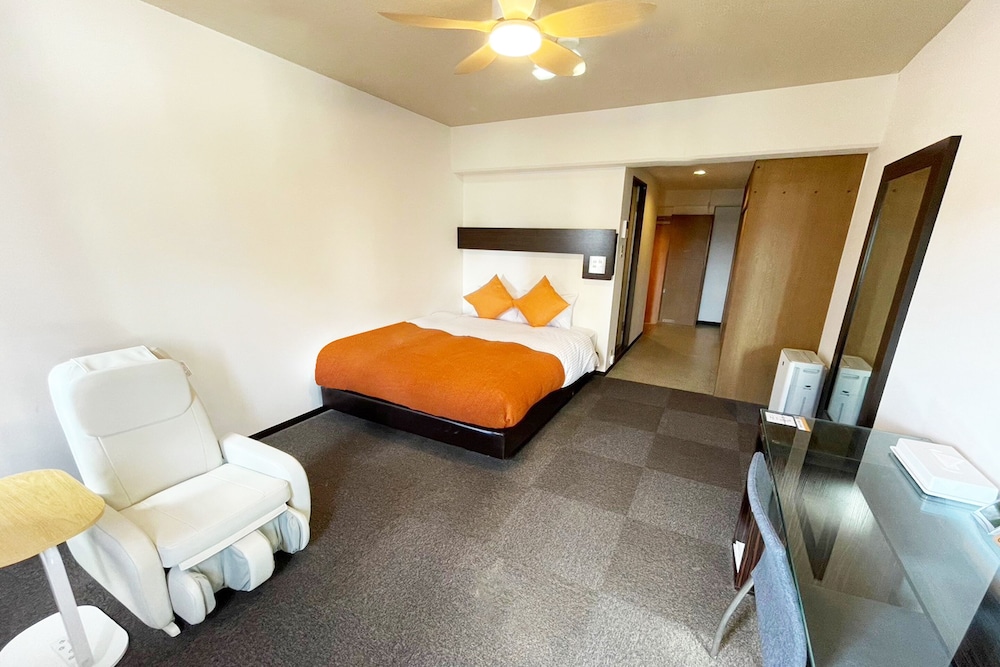 スタンダードルーム　ダブルベッド1台マッサージチェア1台付　禁煙　清掃料金別　連泊時の清掃なし 客室3 | 宮崎マンゴーホテル