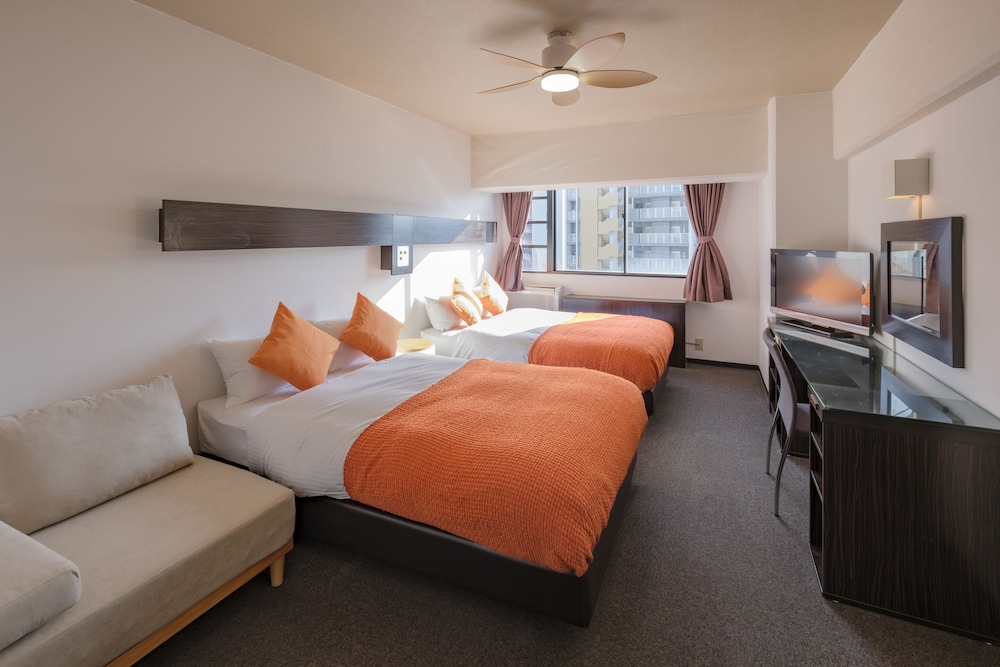 スタンダードルーム　セミダブルベッド2台　禁煙　清掃料金別　連泊時の清掃なし 客室4 | 宮崎マンゴーホテル