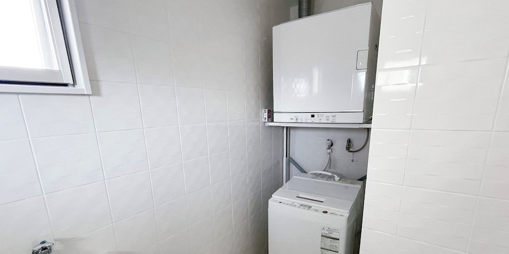 デラックス ルーム ランドリー0 | ブルーシャローズ恩納村リゾート