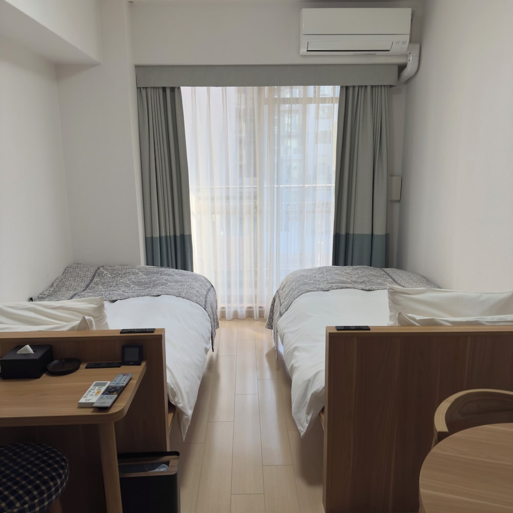 ツインルーム601号室 禁煙 簡易キッチン (毎日の清掃なし/3名利用時 布団を用意） | yksi STAY & APARTMENT OSAKA