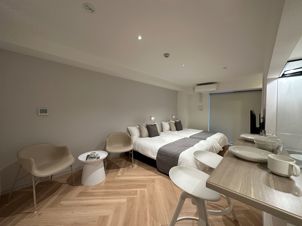 コンフォート スタジオ ダブルベッド 2 台 | Rijodori