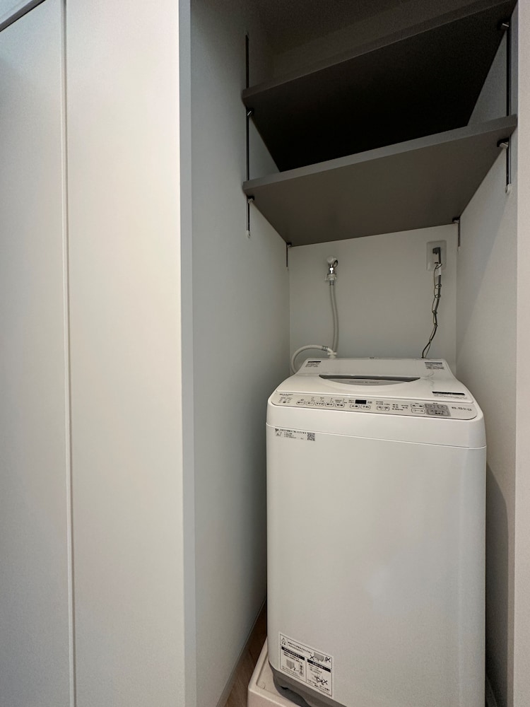 コンフォート スタジオ ダブルベッド 2 台 ランドリー1 | Rijodori