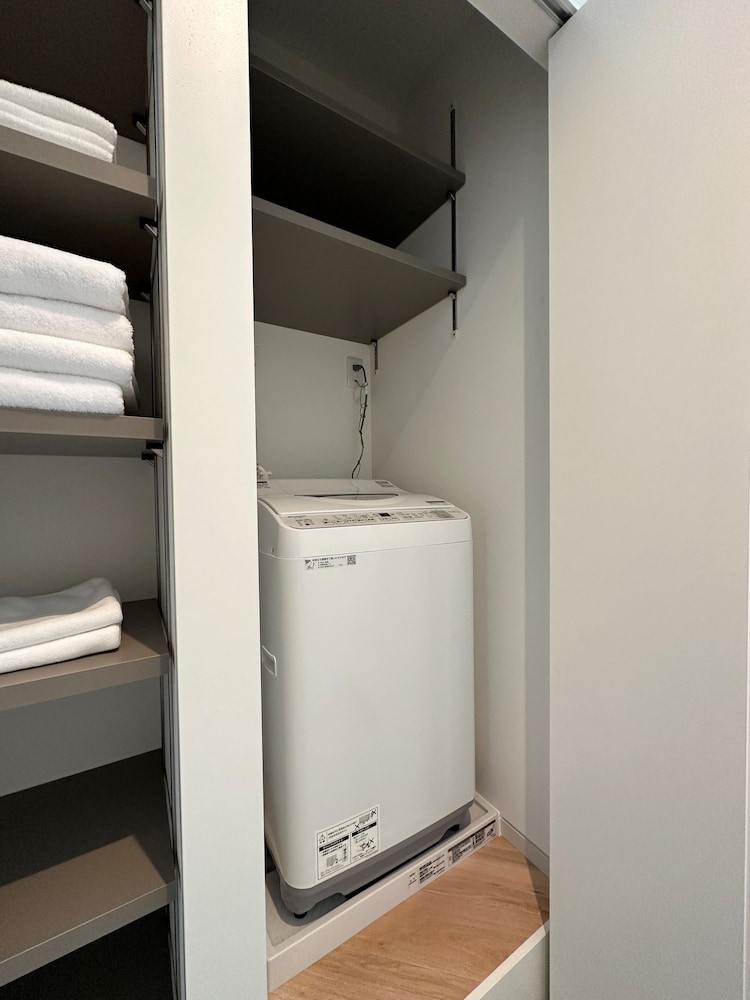 コンフォート スタジオ ダブルベッド 2 台 ランドリー0 | Rijodori