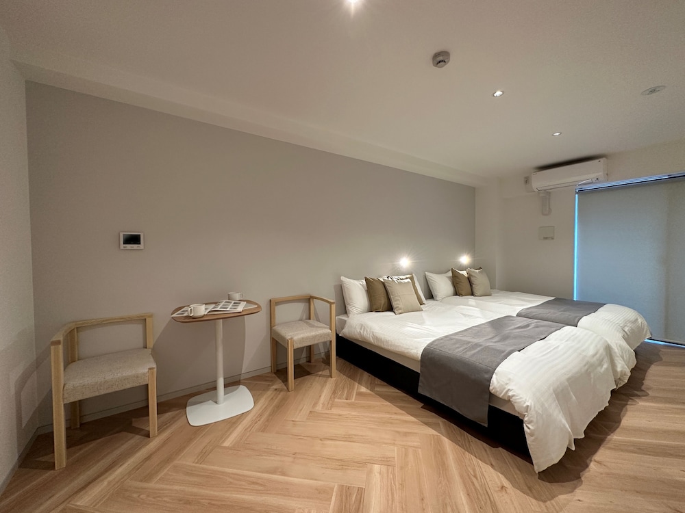 エクスクルーシブ スタジオ ダブルベッド 2 台 | Rijodori