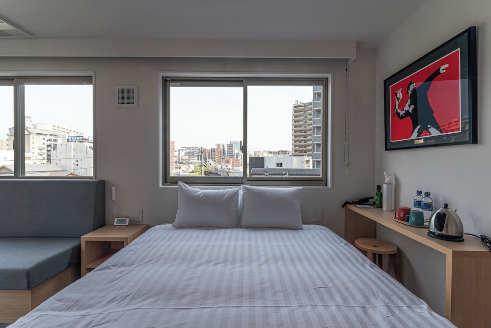 エグゼクティブ ダブルルーム クイーンベッド 1 台 客室1 | 9 HOTEL Tenjin