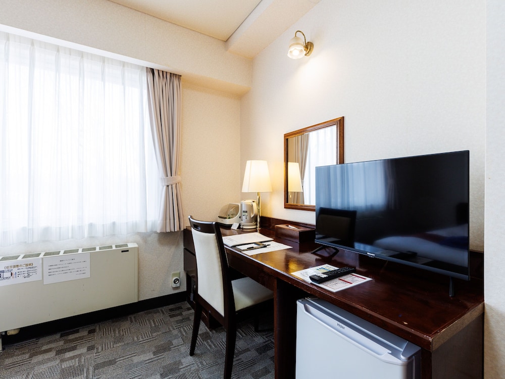 [禁煙] 洋室1~2名〈街側〉 客室2 | Tabist ホテルねむろ海陽亭