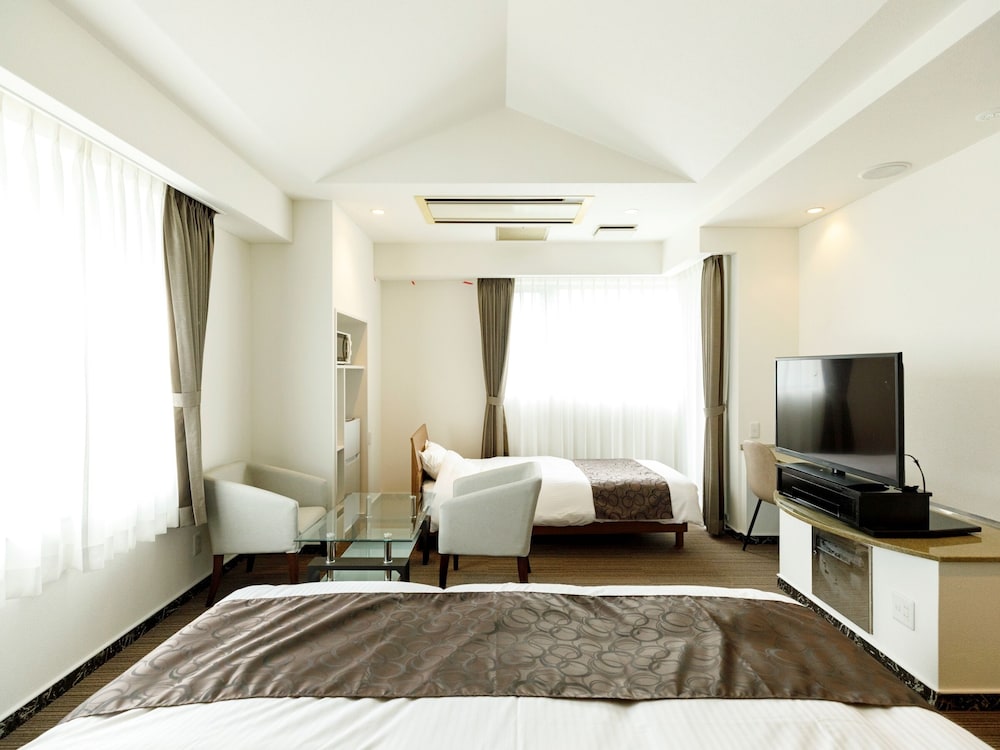 デラックスダブル+シングル 禁煙 客室2 | 別府観光ホテルエース