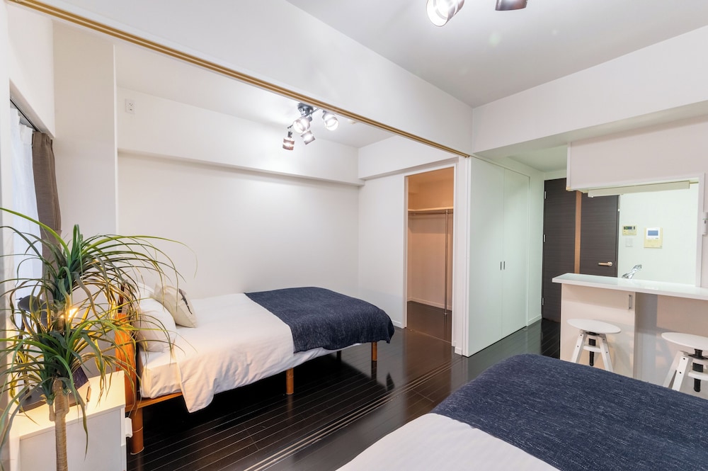 デラックス ツインルーム ダブルベッド 2 台 禁煙 キッチン 客室2 | VIDA 博多