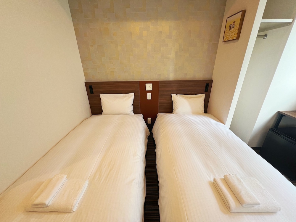 ビジネス ダブルまたはツインルーム シングルベッド 2 台 禁煙 専用バスルーム | N+HOTEL 東京日本橋