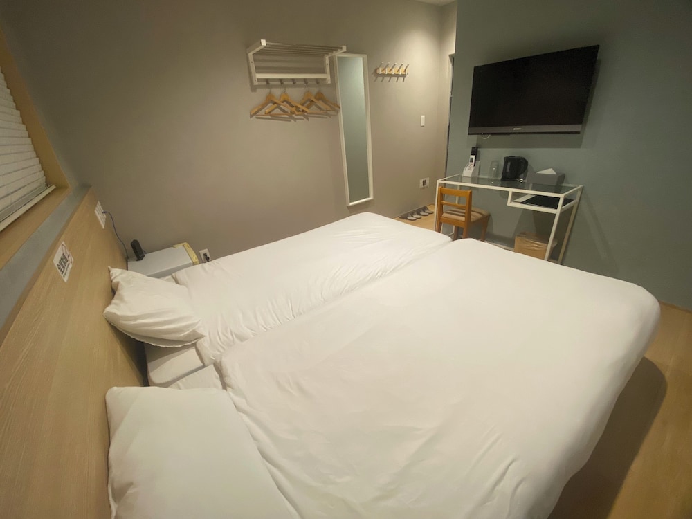 スーペリア ツインルーム シングルベッド 2 台 禁煙 専用バスルーム 客室25 | My Home Inn Sennan Onosato