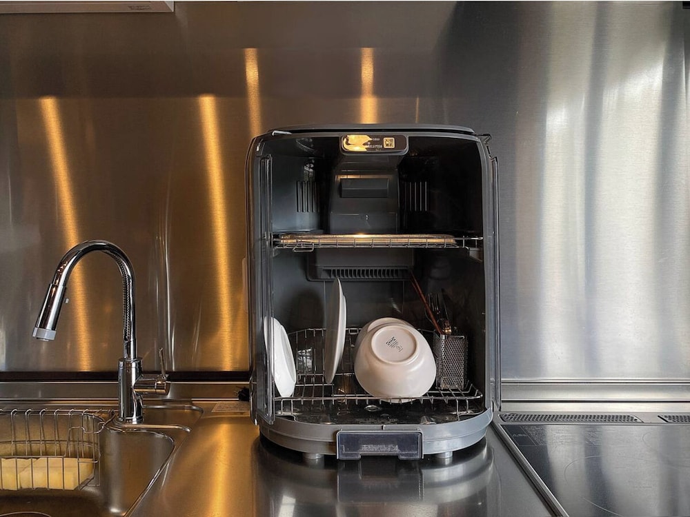 スーペリア ルーム 布団 禁煙 専用バスルーム 共用キッチン0 | My Home Inn Izumisano