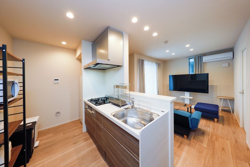 202, 302/4名収容 禁煙 リビング エリア0 | La Terrasse 東駒形 by Tranova